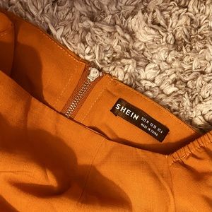 SHEIN summer dress with open sides and back.